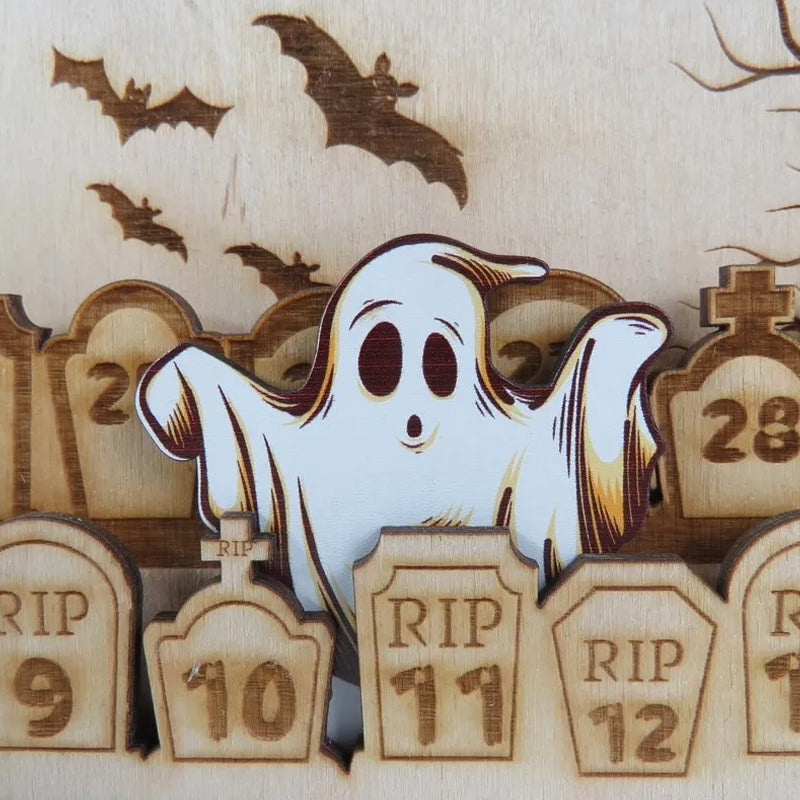Kalendarz odliczający halloween z nagrobkami grawerowany