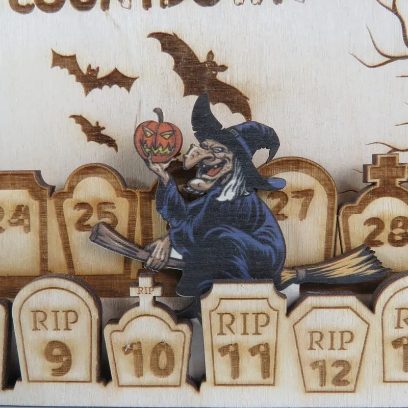 Kalendarz odliczający halloween z nagrobkami grawerowany